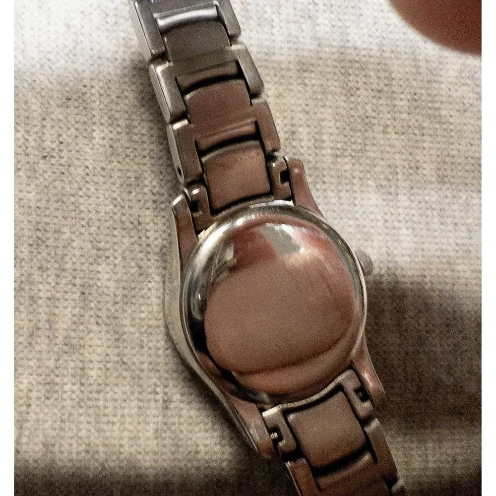 Citizen Women's Eco-Drive Silver Stainless Steel 25mm 10ATM Watch‎ E011 Movement